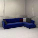 blue sofa with black pillows