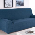 blue sofa in a cover