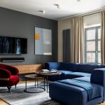 blue sofa with red armchair