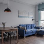 blue sofa with brown table