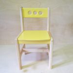 adjustable children's chair yellow with holes