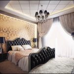 black bed with light walls