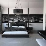 bedroom with dark linen and photo wallpaper