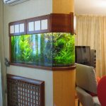 cabinet under the aquarium in the wall