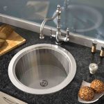 round gray sink cabinet