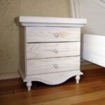 white bedside table on legs