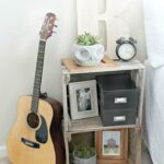 bedside table with guitar