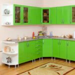 green kitchen with carpet