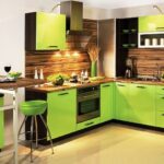 green kitchen with wood