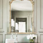 large mirror over the fireplace