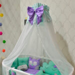 baby canopy with purple bow