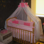 baby canopy with pink ruffles