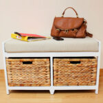 banquette in the hallway with a bag