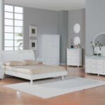 white furniture with gray walls