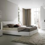 white furniture with brown curtains