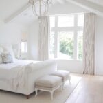 spacious white bedroom