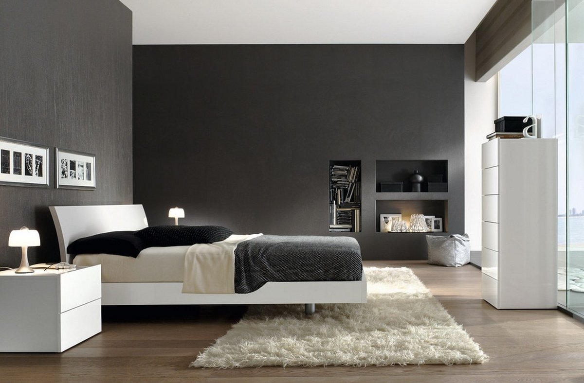 white furniture in a dark bedroom