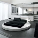 white bedroom with round bed