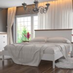 chambre blanche avec grand lit