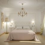 white bedroom with baroque chandelier