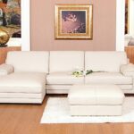 white leather sofa with pouf