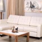 white leather sofa with horses