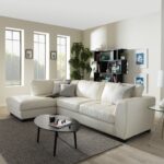 white leather sofa with oval table