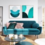 turquoise sofa with blue paintings