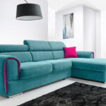 turquoise sofa with raspberry trim