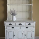 white kitchen sideboard with lavender