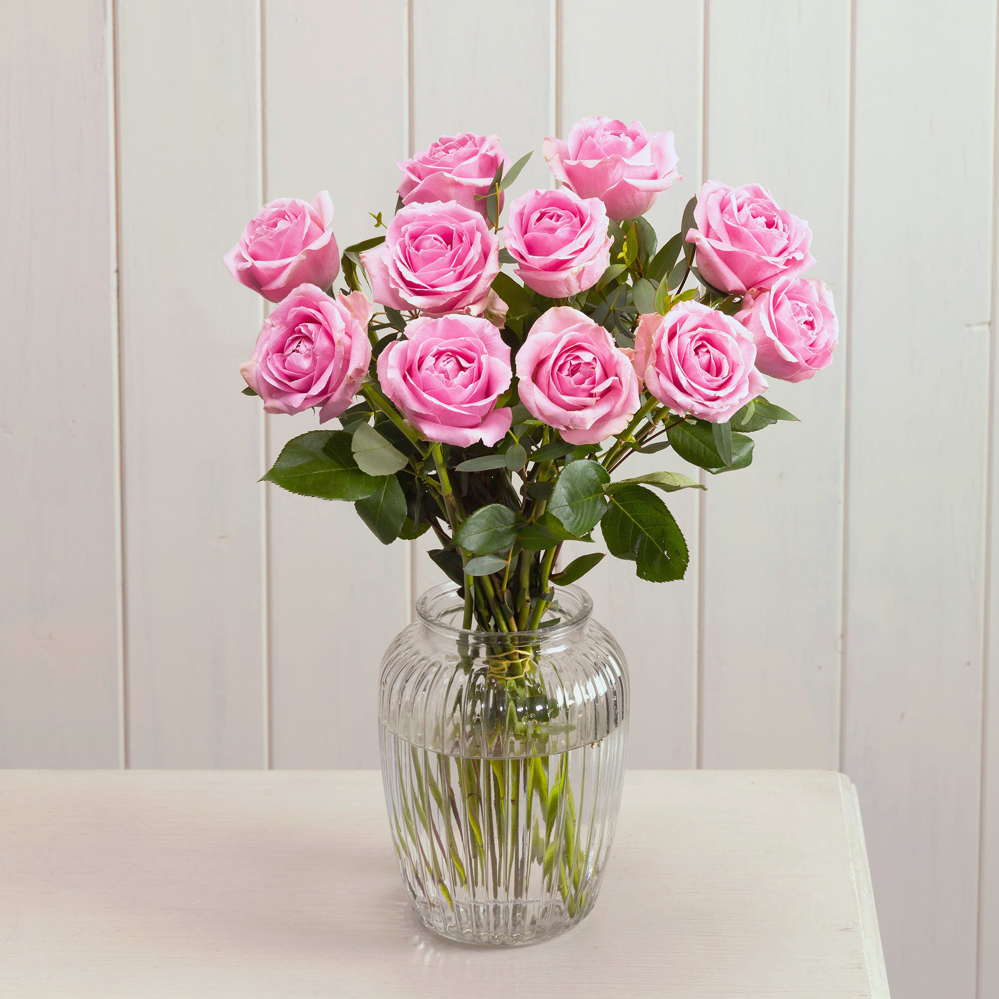 a bouquet of roses in a vase