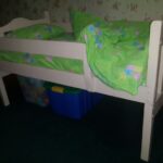 baby bed made of wood green