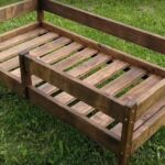 children's bed made of wood in nature