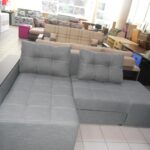 sofa with to gray in the store