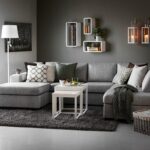 sofa in the living room gray with pillows