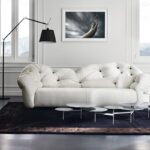 sofa in the living room white quilted