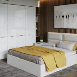 white furniture in the bedroom with colored linen