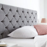 bed with gray headboard