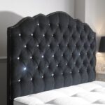 bed with headboard dark with rhinestones