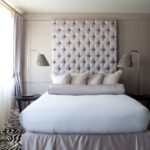 bed with high headboard