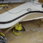 production of curved cabinet