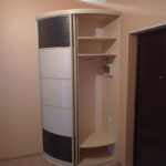 radius cabinet near the door