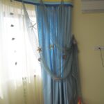 blue curtains in the nursery