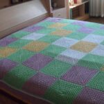 bedspread of colorful squares