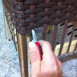 pruning rattan with a knife