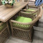 light green rattan armchairs