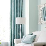 mint curtains with floor lamp