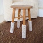 knitted overlays on the legs of chairs