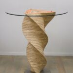 wooden table on a spiral leg