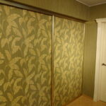 old wardrobe with wallpaper